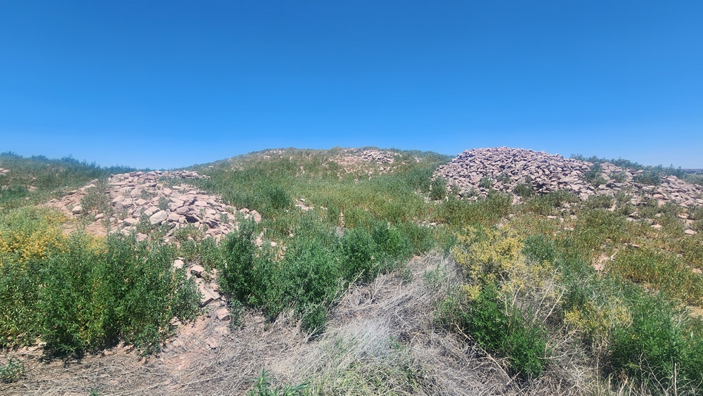 Archaeological ancient village rubble mound.